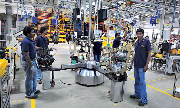 Ergonomic workstations and programmed power tools enable workers to build bikes quickly and accurately. 